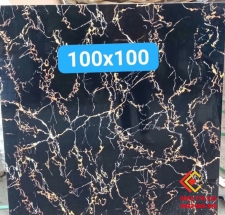 Gạch bóng kiếng 100x100 đen nhủ vàng