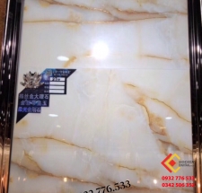 Gạch bóng kiếng 60x120 hàng khắc kim vân nâu