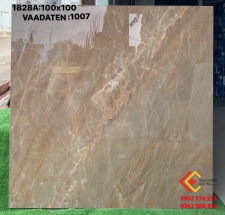 Gạch khổ lớn 100x100 màu nâu bóng kiếng ốp lát tường nhà tại quận 5 